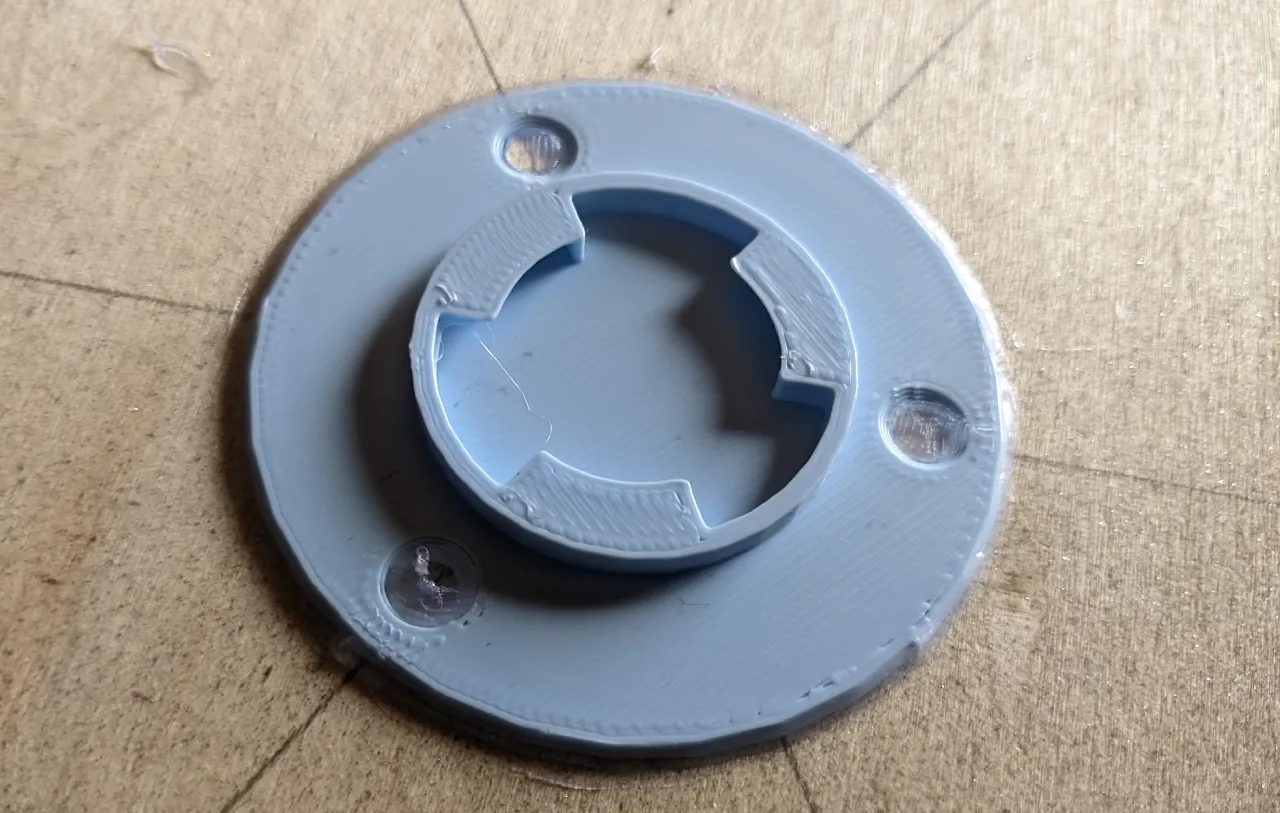 The part with the hooks on the inside glued onto a wooden surface