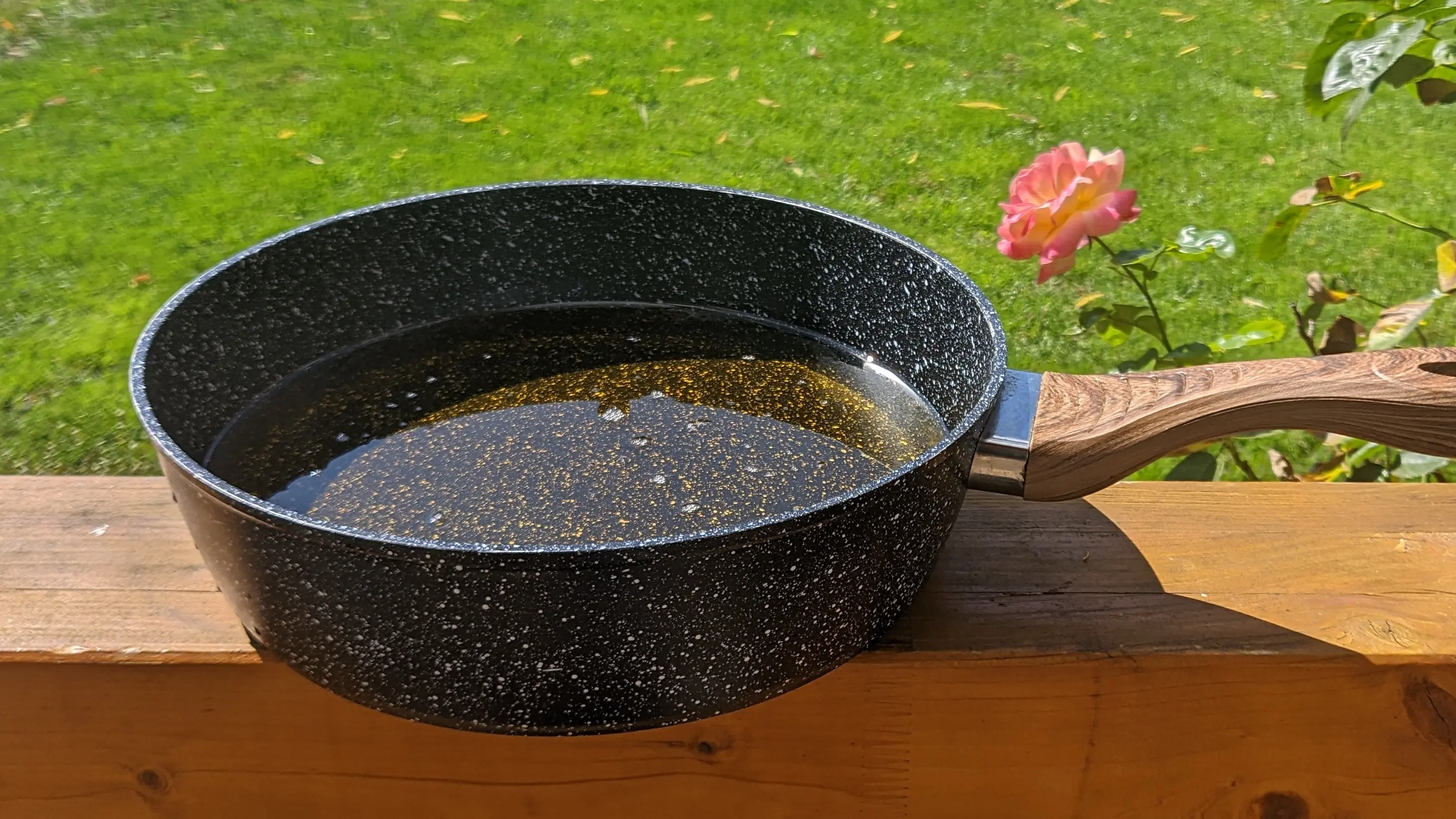 A large, deep pan filled 2 to 3cm deep with oil