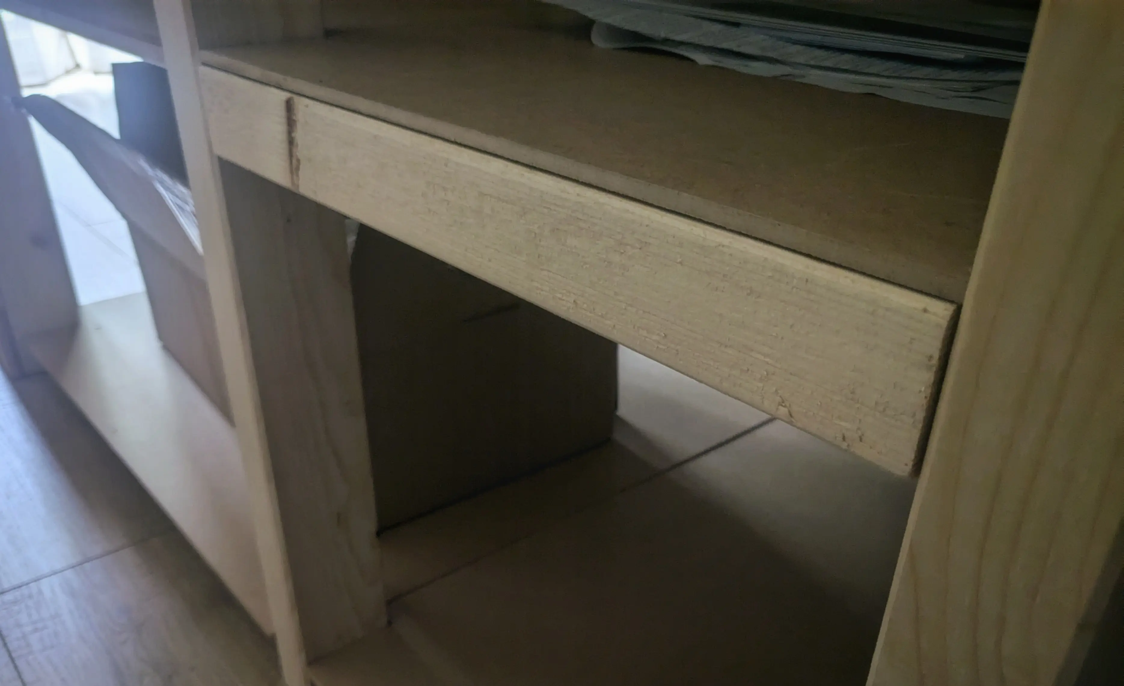 Close up of an additional 74 by 44 mm wooden beam mounted in the small shelf unit.
It supports the inlay and is placed at the perfect height to act as a footstool. Close up of an additional 74 by 44 mm wooden beam mounted in the small shelf unit.
It supports the inlay and is placed at the perfect height to act as a footstool.