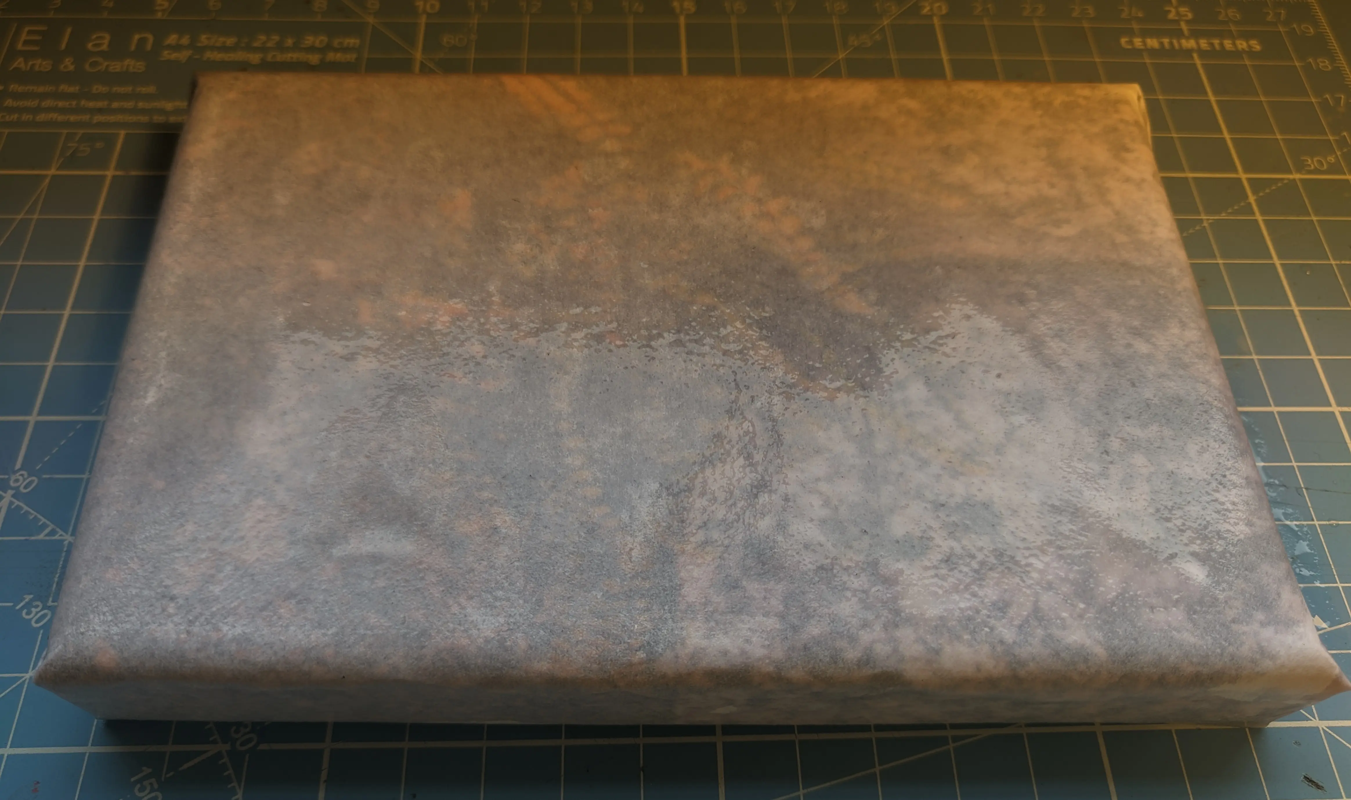 Canvas with the paper wrapping soaked with water