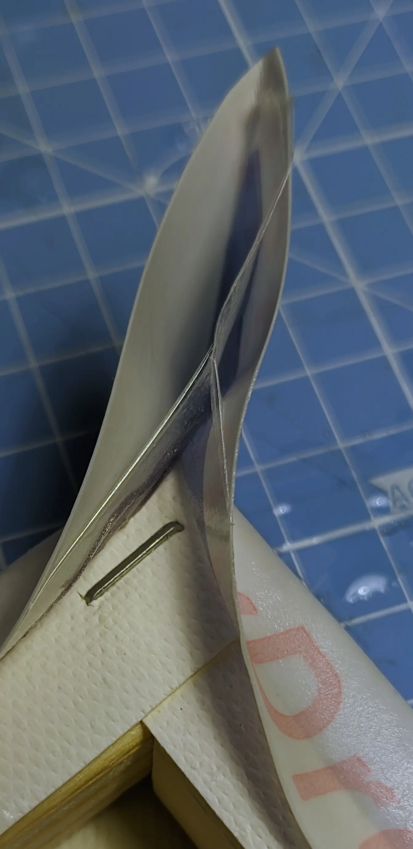 The outside paper peeling itself of from the formed flaps