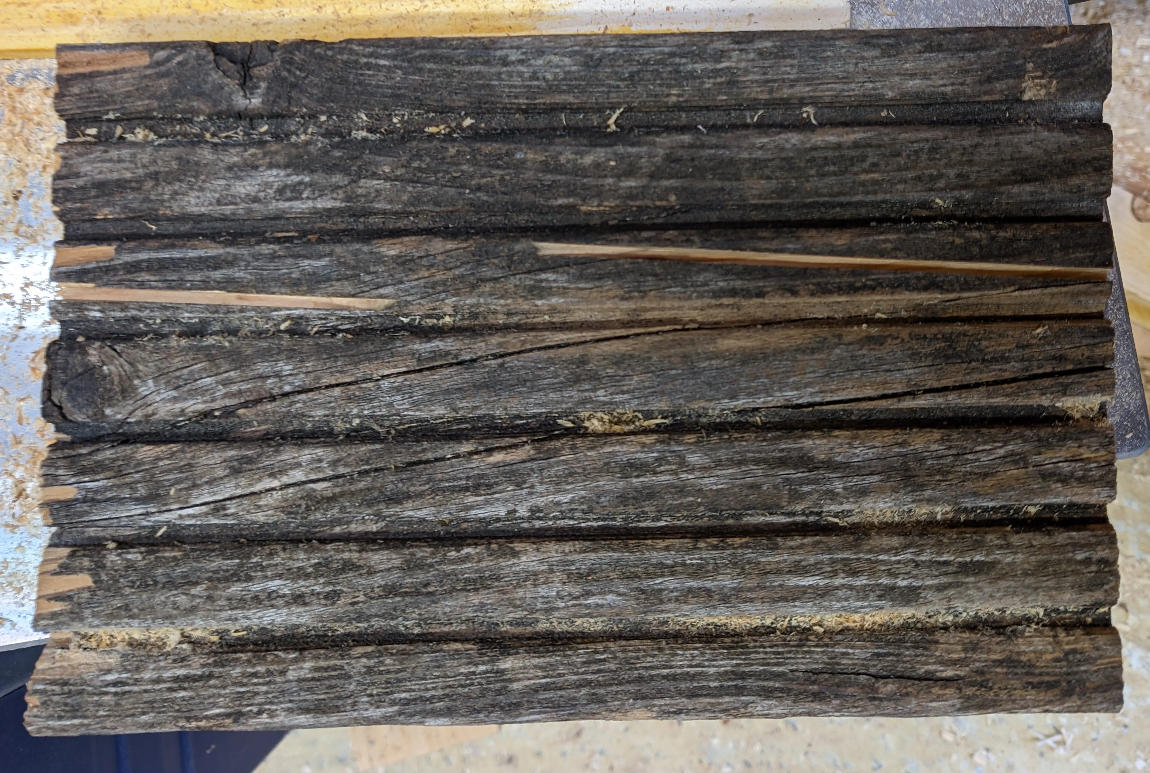 Two cuts on either side of the back piece, going off at about 10 degree angles in either direction.