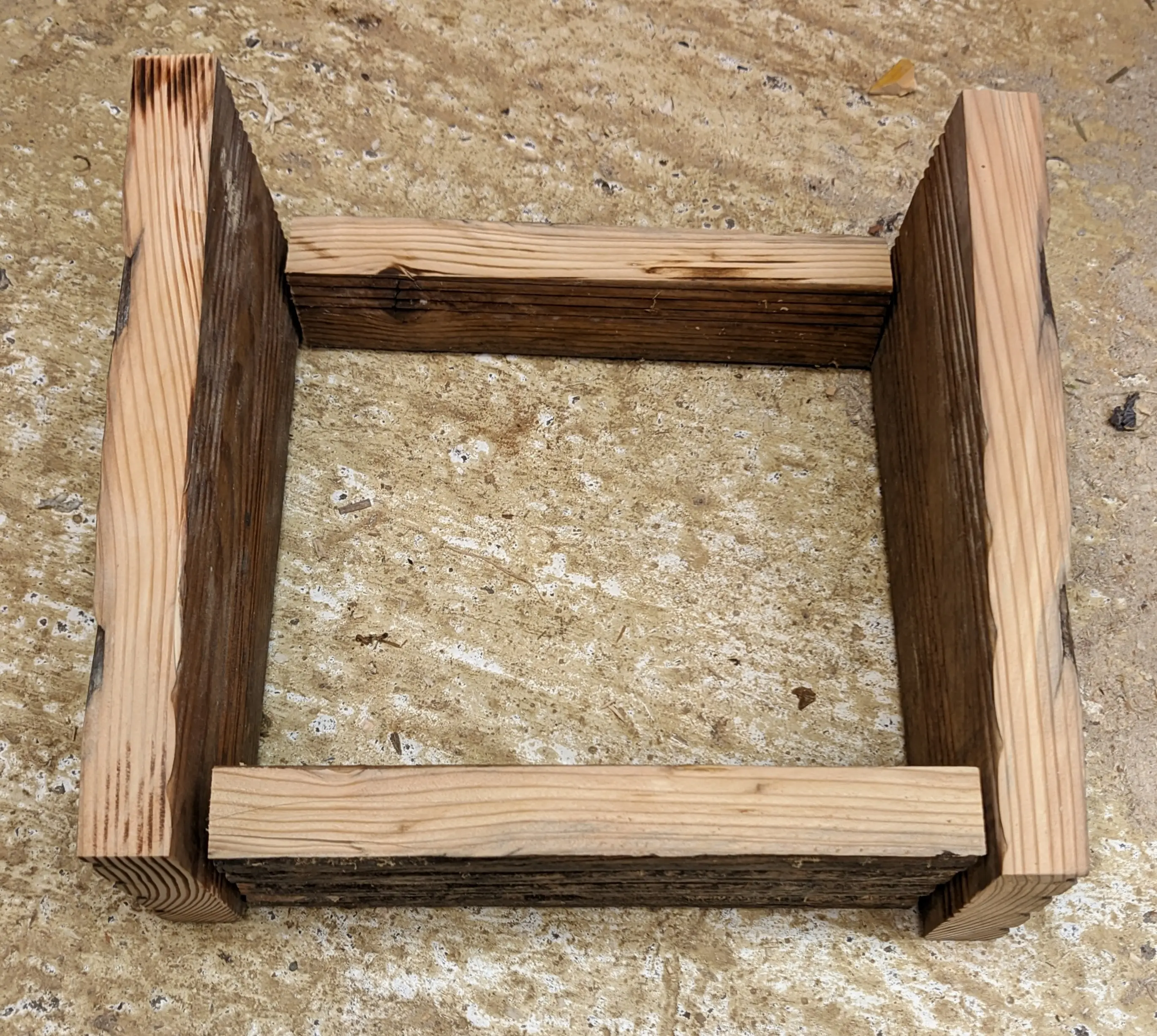 All four side pieces are aligned to show how the hut comes together. The front and back pieces side inside the left and right pieces.