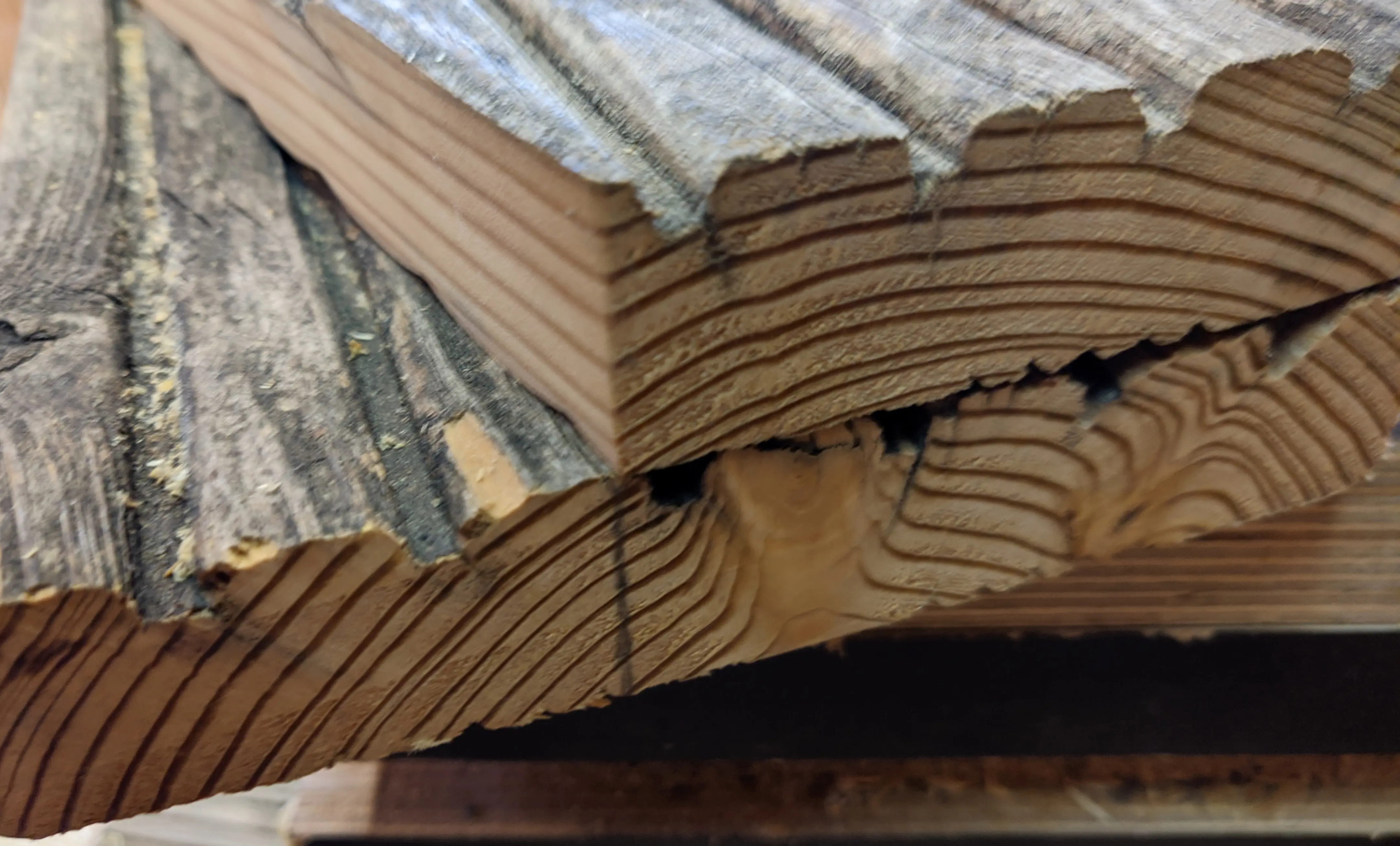 Side piece stacked on top of the last remaining scrap piece. A pencil mark has been made where the back end.