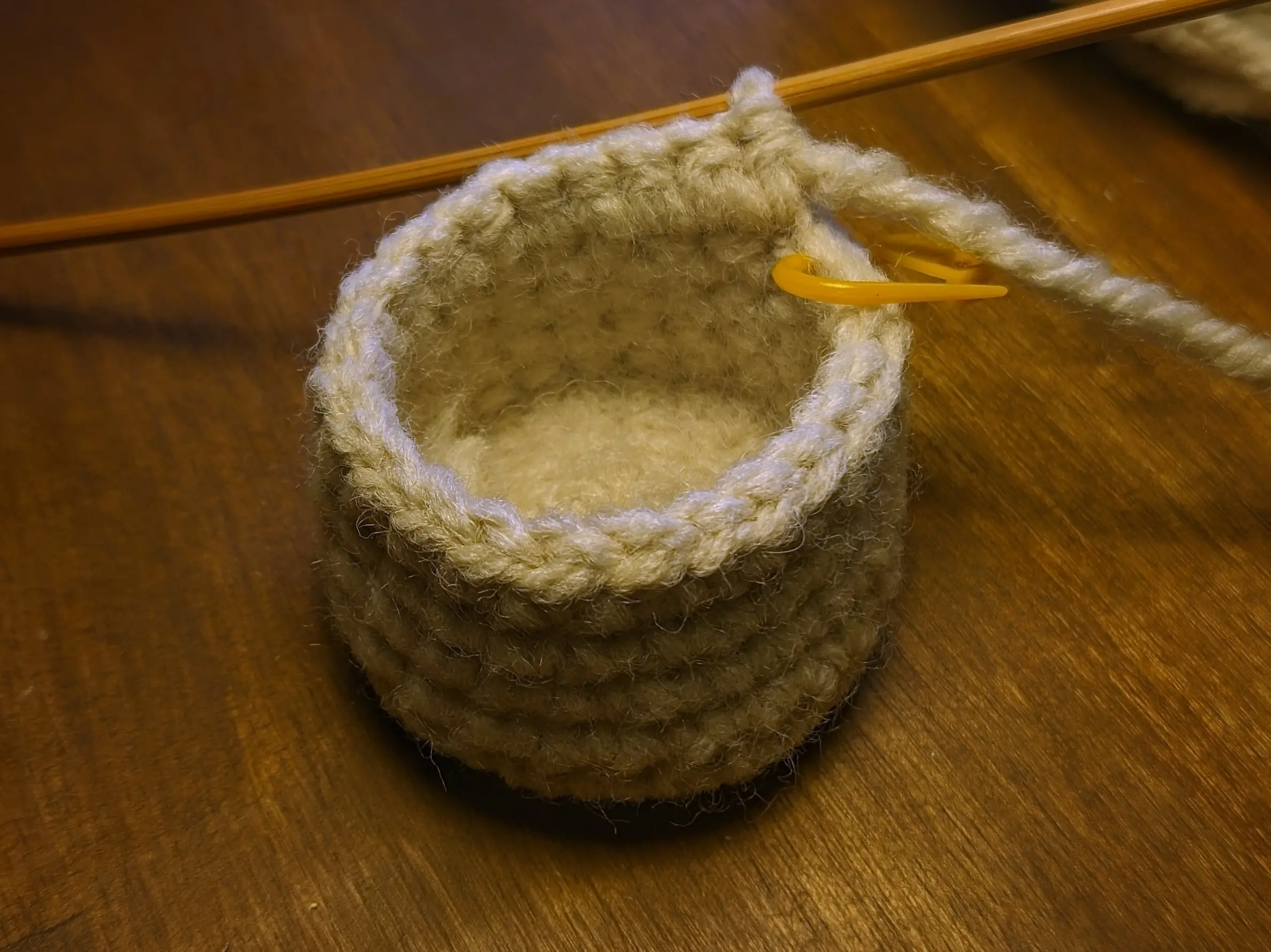 Cylindrical walls made of crochet loops extending from the crochet disk